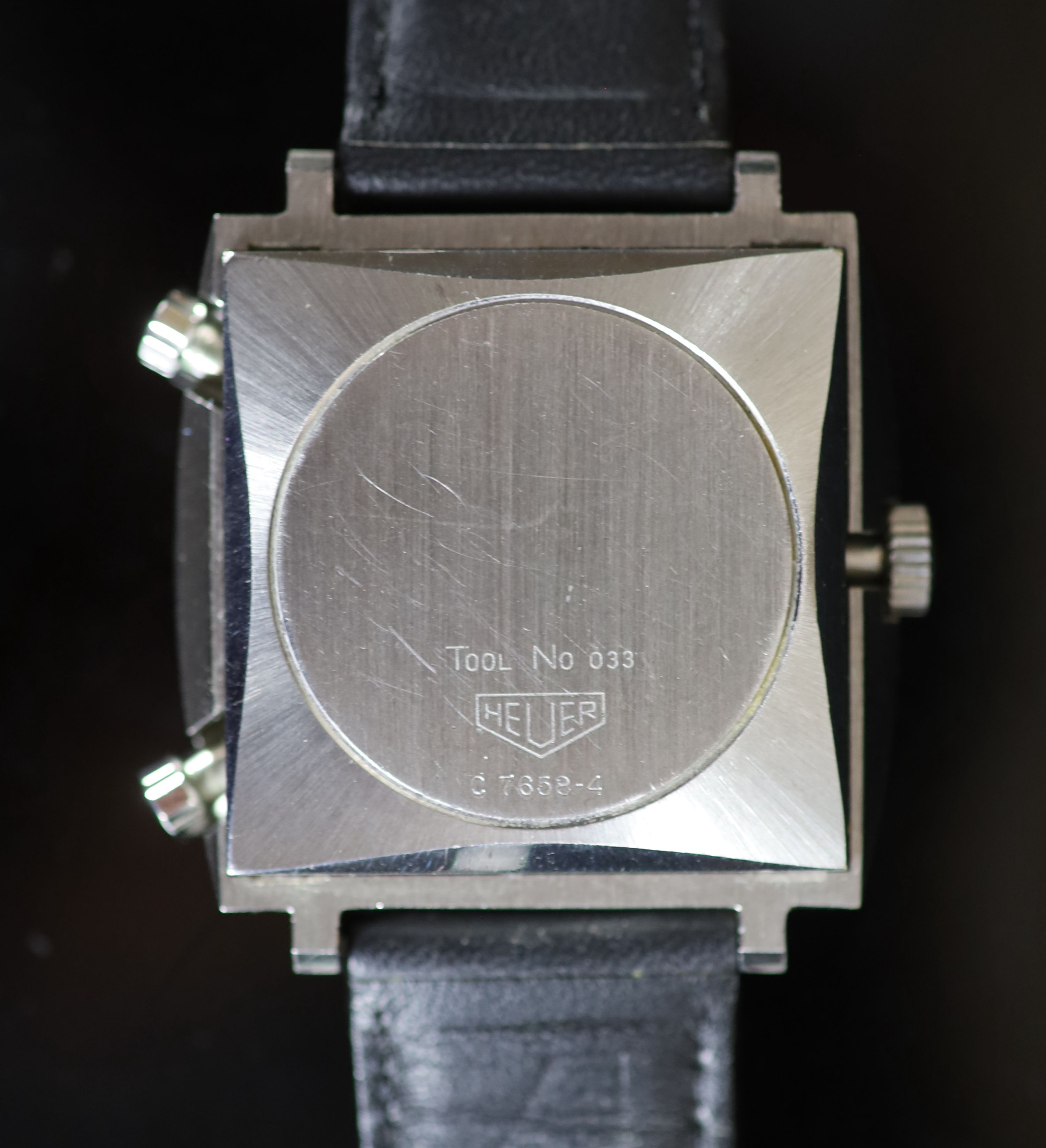 A gentleman's early 1970's steel Heuer Monaco Automatic Chronograph square cased wrist watch, on later associated leather strap